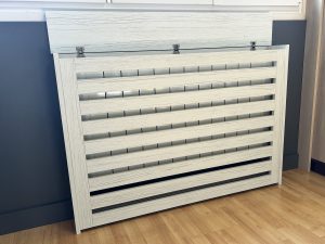 Cache radiateur - lames horizontales - capot ouvert-